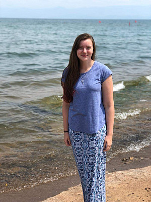 Megan McTaggart standing on a beach