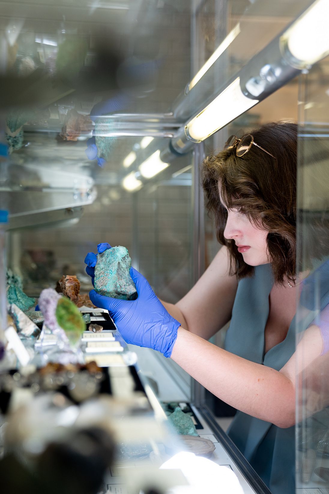 Juliana Valerio '24 examines Pfahler's collections of rocks and minerals.