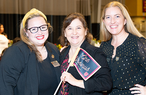 Ursinus staff (from l to r) KC Boyle, Maria CarosellaP'23, P'23, and Susan Fazio celebrate at ina...