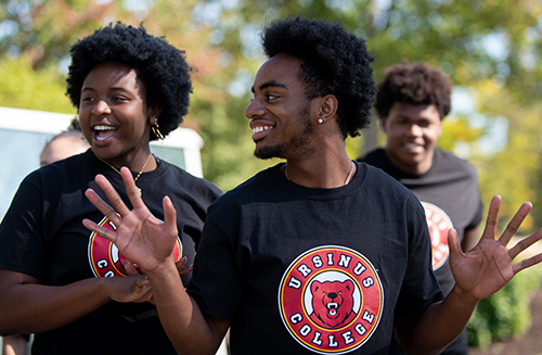 Esther Akande '24 and Michael Agbeye '24 performwith other Seismic Step members during theinaugur...