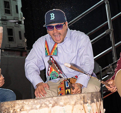 A drummer from Blazing Bear performs at PresidentHannigan's inauguration ceremony.