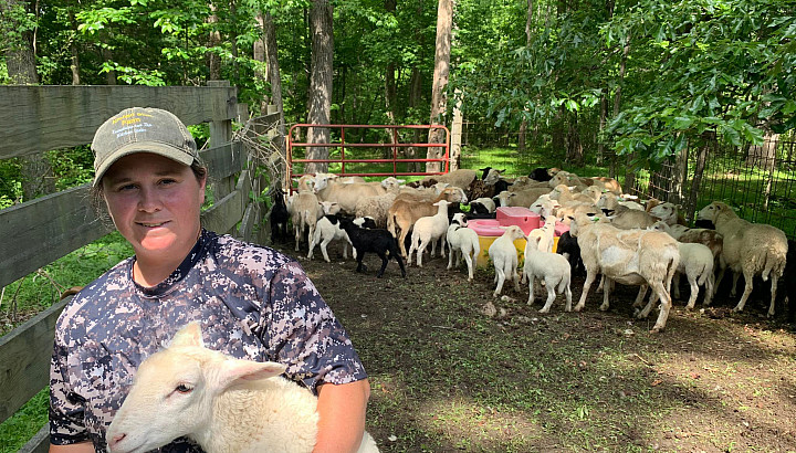 alumna Jess Lamina Gray with sheep