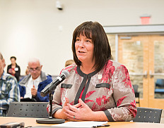 President Robyn Hannigan delivers stormwater testimony.