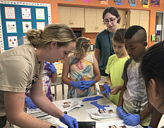 Mya Knappenberger '23 works with campers at Orion Communities