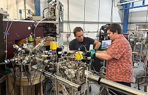 Ursinus student Ewan Chattin (right) installs lead shielding on equipment at Florida State University with Dr. Mark Sieker, a research co...
