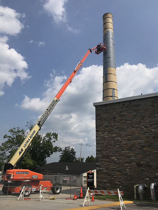 Painting the substrate of the smokestack