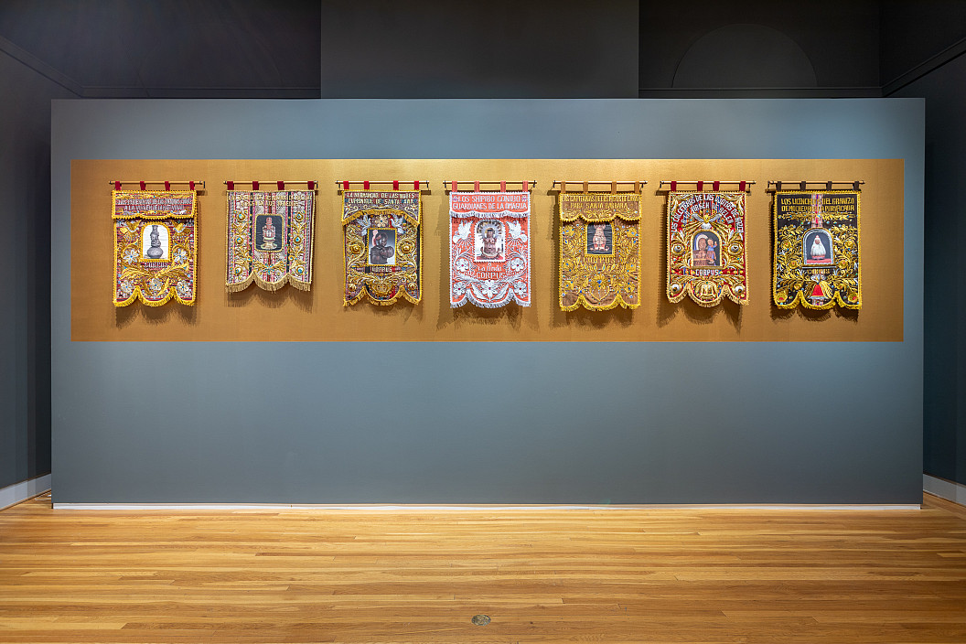 Banners from Kukuli Velarde's CORPUS series. As installed in 2024 exhibition Kukuli Velarde: Free, Total, Faithful, and Fruitful.