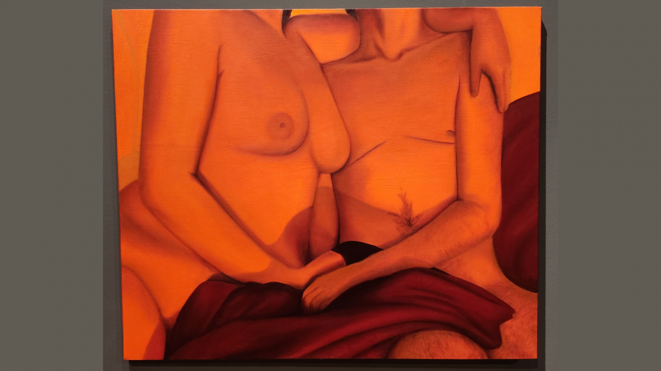 A couple embracing. Canvas is saturated in a bright orange color.