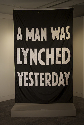 Terry Adkins, A Man Was Lynched Yesterday, 2009. Polyester fabric. 58 1/4 x 92 inches. Courtesy o...