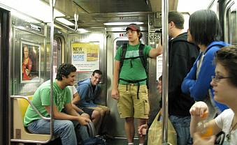 Riding the New York City subway.