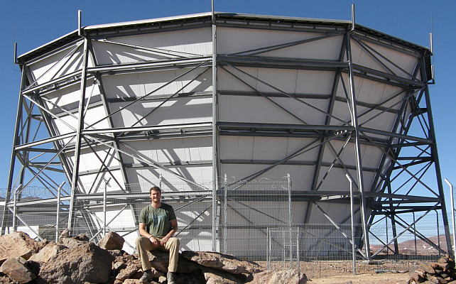 Jon Ward ’13 working at a telescope in the Andes mountains.