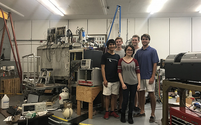 Jessica Nebel-Crosson (UC ’21) and collaborators in front of the Enge split-pole spectrograph (SPS) at the Fox Superconducting Linear Accelerator Laboratory at Florida State University in summer of 2019.