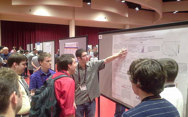 Mike Vennettilli explains his research at DAMOP 2015 in Madison, WI.