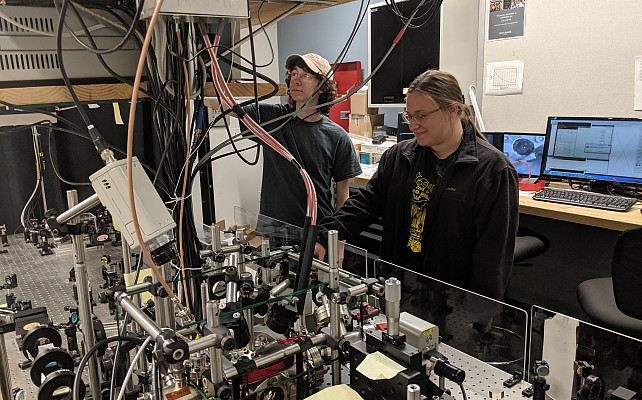 Briana Strickland and Marty Dryfoos work in the ultracold atomic physics lab at Bryn Mawr College in 2019.