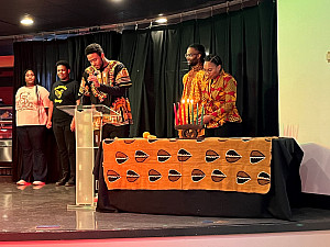 Lighting Candles at the Annual Kwanzaa Celebration 