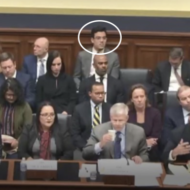 Paul (circled) covering a House Financial Services Committee hearing, reporting back to stakeholders in London