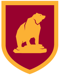 This crest incorporates an image of a grizzly bear.