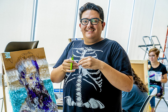 In the Berman Museum of Art, artist Justin Favela has spent several weeks working on a large piñata piece with the help of student, facu...