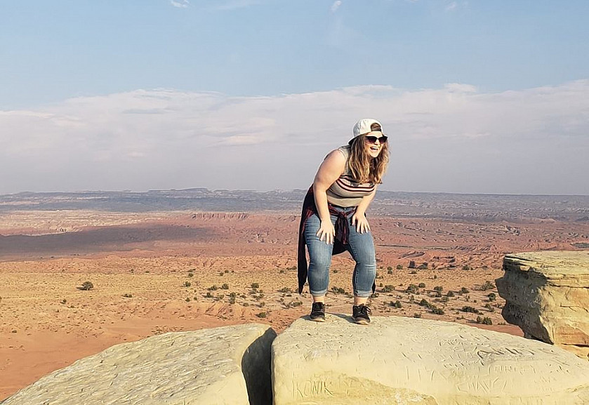 2018-2019 Energy Fellow Kate Gibson on a rocky outcropping