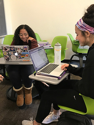 Writing Fellows giving each other feedback