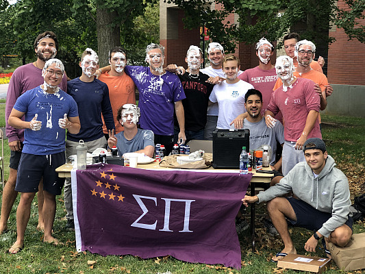 Brothers of Sigma Pi held a “pie a brother in the face” fundraiser as part of the Greek systems commitement to philanthropy…. that is one way to do it!