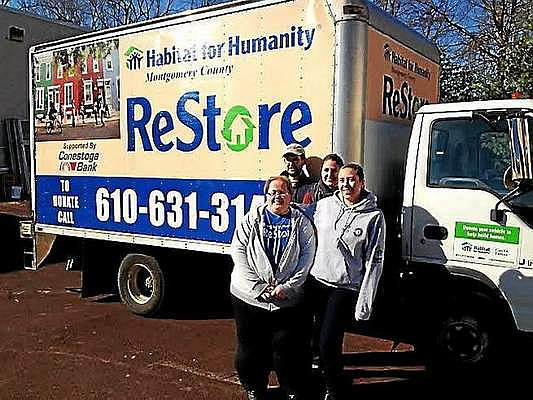 ReStore staff members Kathy Walsh, left, Brian Gillen, Abby Rambo and Erika Reinhard stand outside the West Norriton shop. 21st Century M...