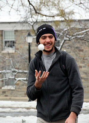 Photo of Axel González with a snowball